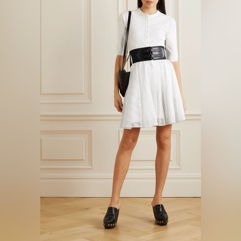 ALAÏA
Laser-cut leather-trimmed broderie anglaise cotton mini skirt